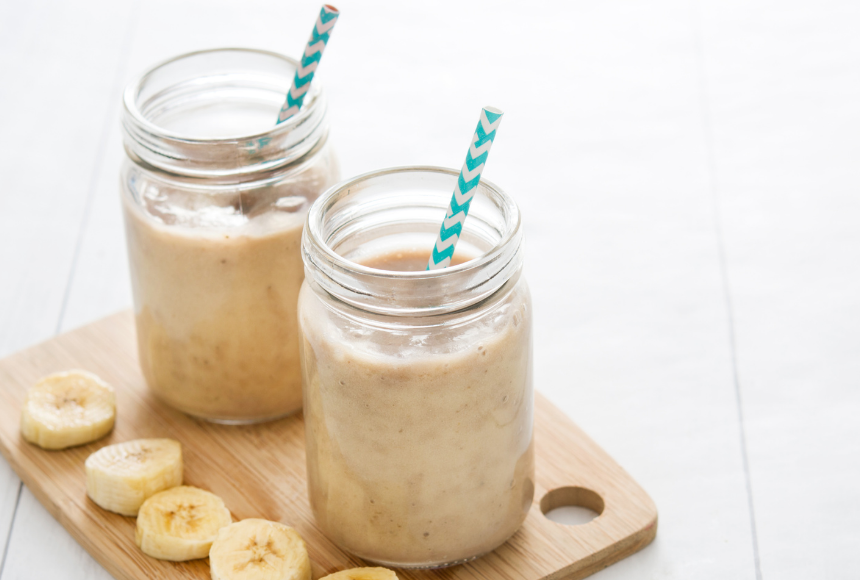 High-fiber digestion smoothie for constipation in glass with straw